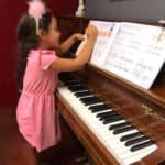 preschooler taking piano lessons in Oak Park